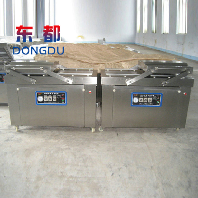 Beef granule tensile film packaging equipment Dongdu multi-function vacuum sealing machine Continuous braised duck neck packaging machine