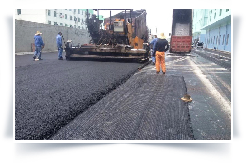 Strengthening old cement pavement with reinforced self-adhesive glass fiber grating and asphalt surface reinforcement geogrid