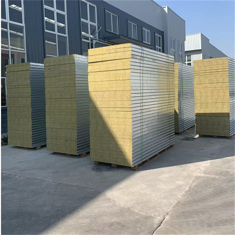 Processing of colored steel tile insulation composite roof with rock wool sandwich board on the factory roof