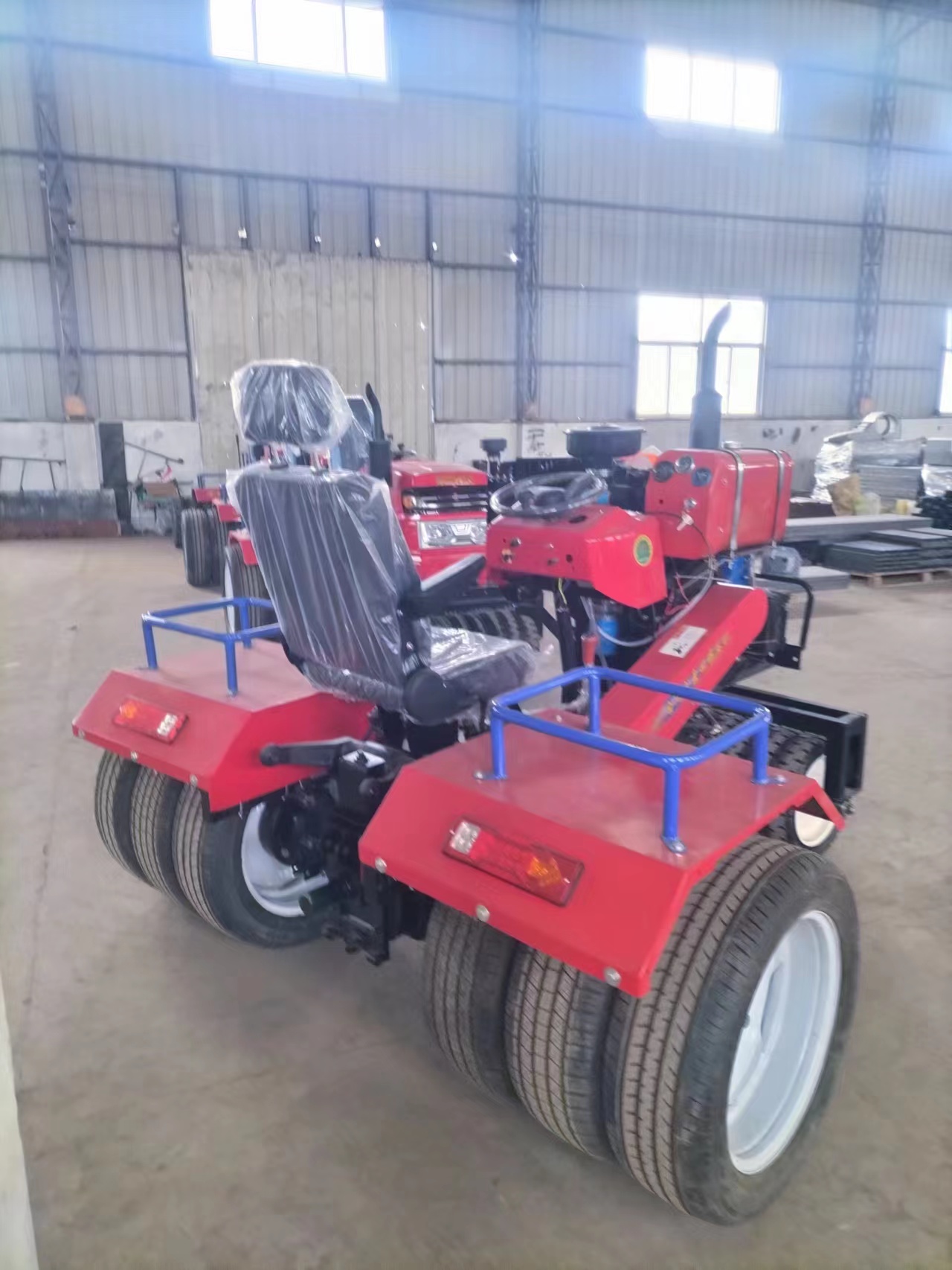 Self propelled wheat compactor, diesel driven ballast press with adjustable width