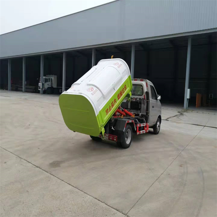 Dongfeng Xiaokang 3-way carriage detachable hook arm garbage truck with blue license plate can enter the underground garage, with one vehicle equipped with multiple containers