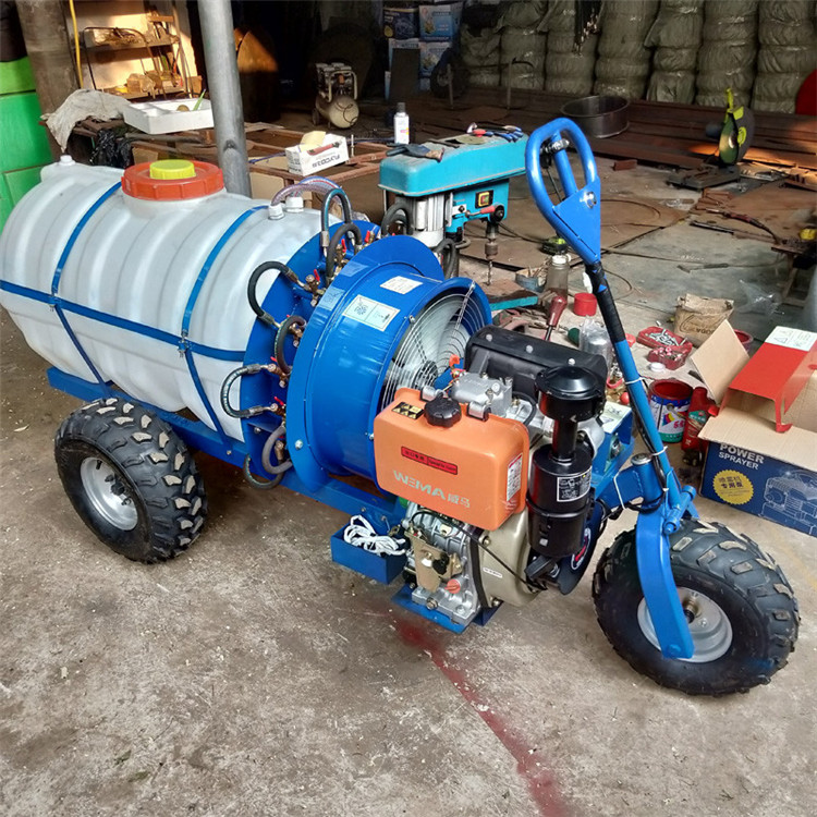 Vineyard sprayer Three wheeled self-propelled air driven sprayer in the morning Seat mounted spray