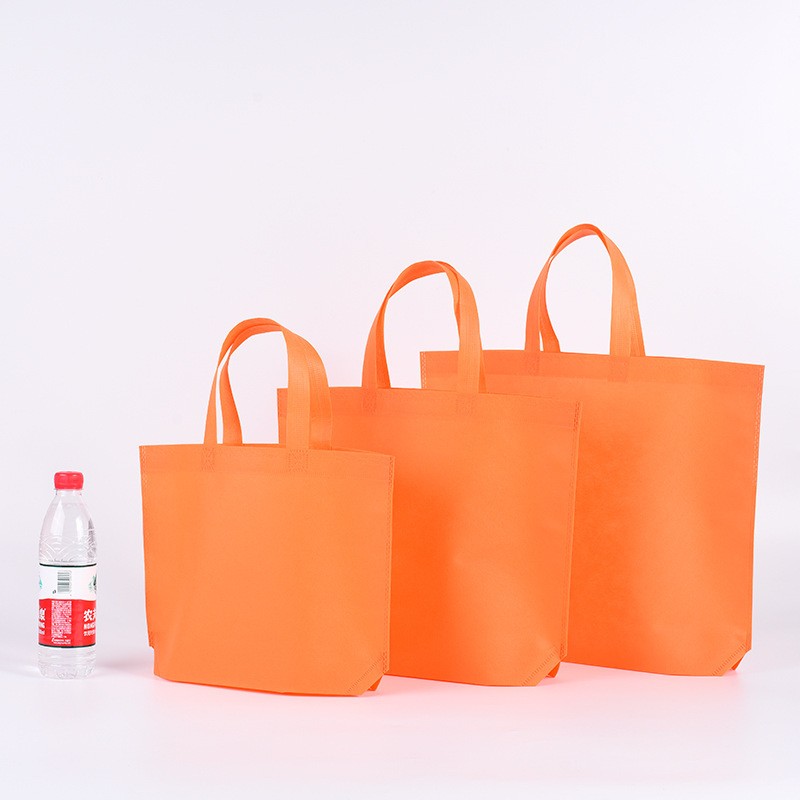 Handheld non-woven fabric bag, customized blank advertising, solid color foldable shopping bag, catering, disposable takeaway packaging bag