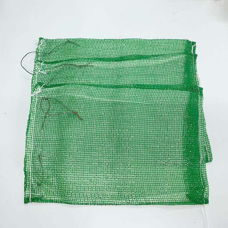 Customized 50 * 80 green bags with high tensile strength for landscaping and grass seed planting