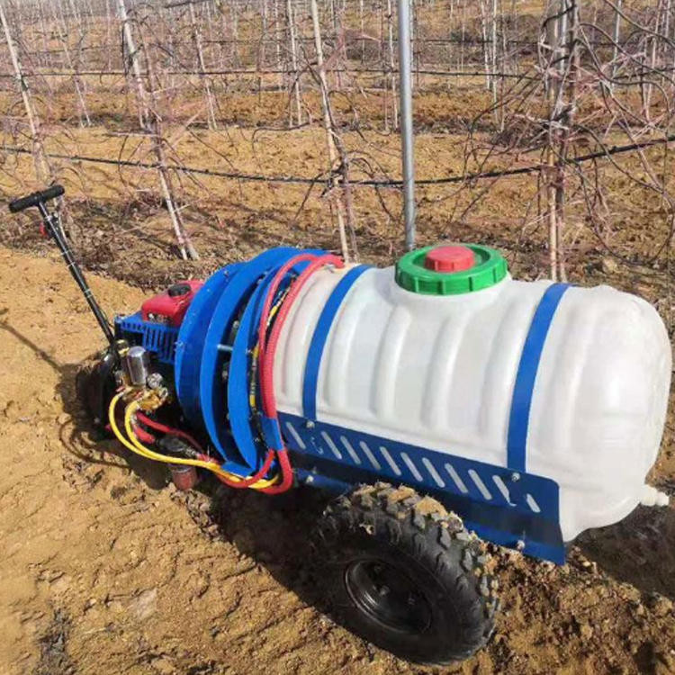 Vineyard sprayer Three wheeled self-propelled air driven sprayer in the morning Seat mounted spray