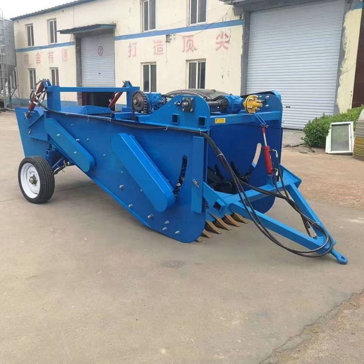 Four wheeled tractor with agricultural stone picker, automatic small stone screener for land reclamation, agricultural gravel collector