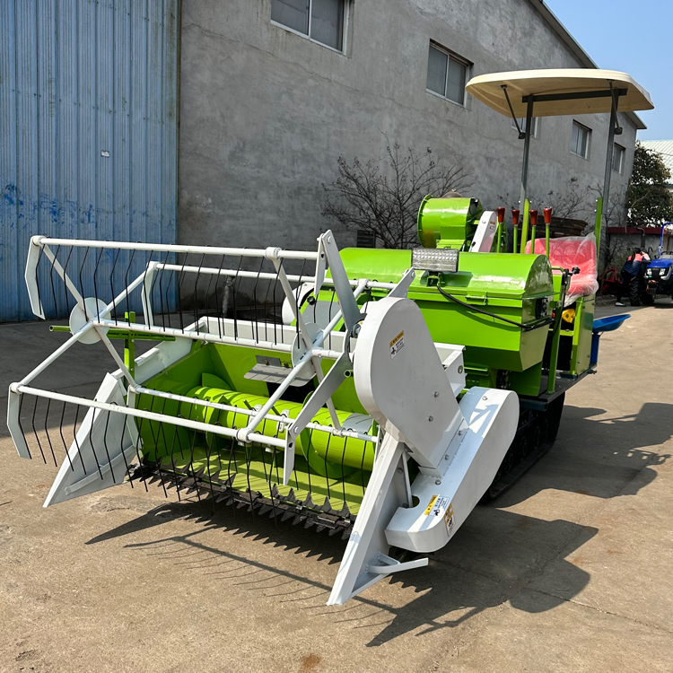 Wheat combine harvester track wheel can be used for both water and drought. 25 horsepower rice and wheat harvesting, threshing, and bagging integrated machine