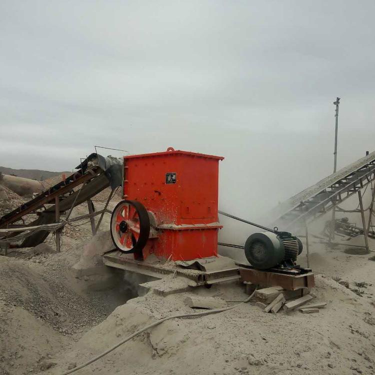 The size of the mechanical discharge for crushing construction waste cement blocks by the impact crusher manufacturer can be adjusted