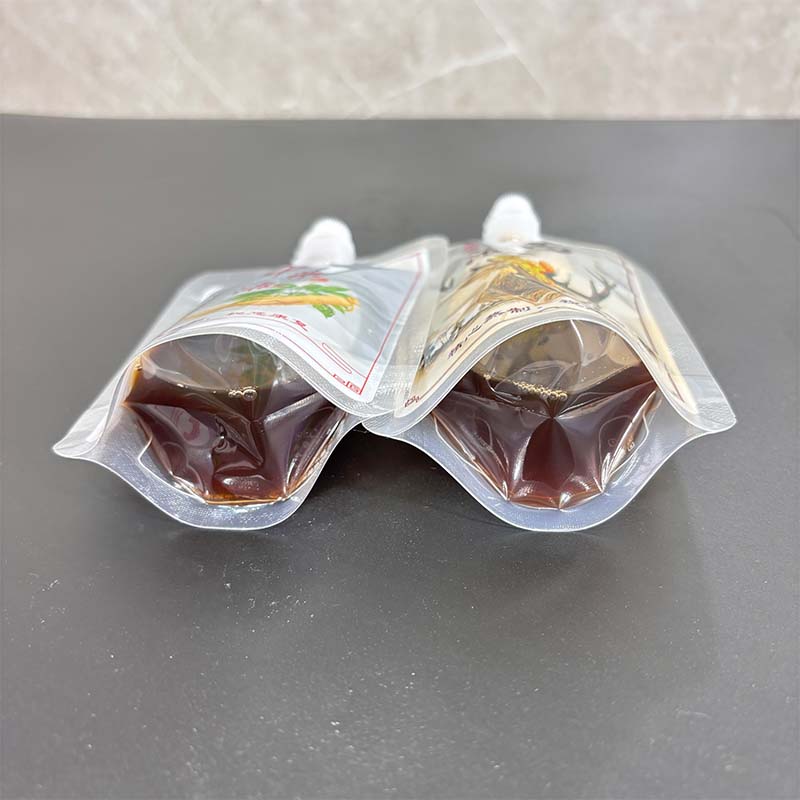 Traditional Chinese medicine liquid packaging bag Liquid traditional Chinese medicine roll film beverage soybean milk suction nozzle self standing bag spot support customization