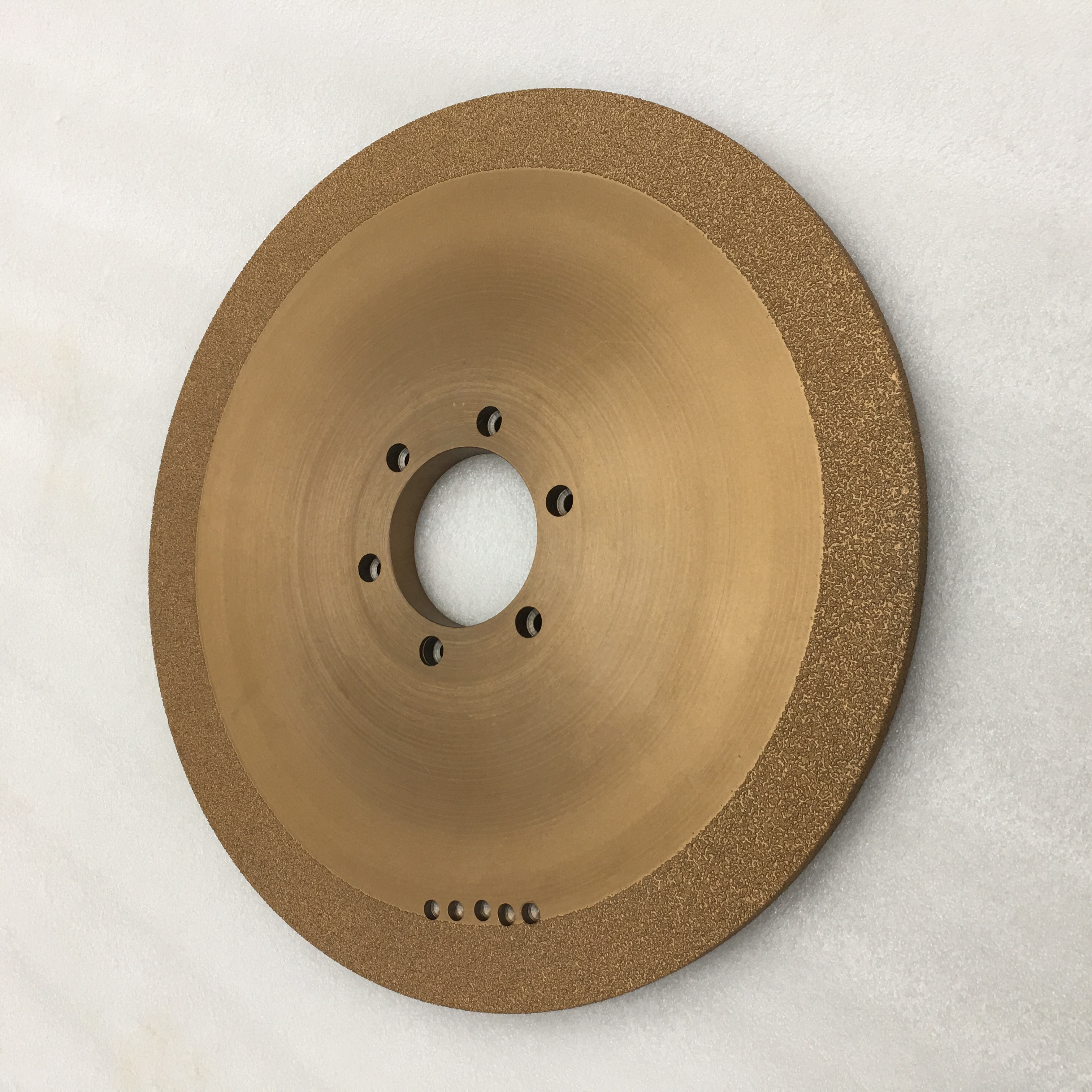 Ordered arrangement of diamond abrasives for special shaped grooves in processing cast iron plastic parts with brazed grinding wheels