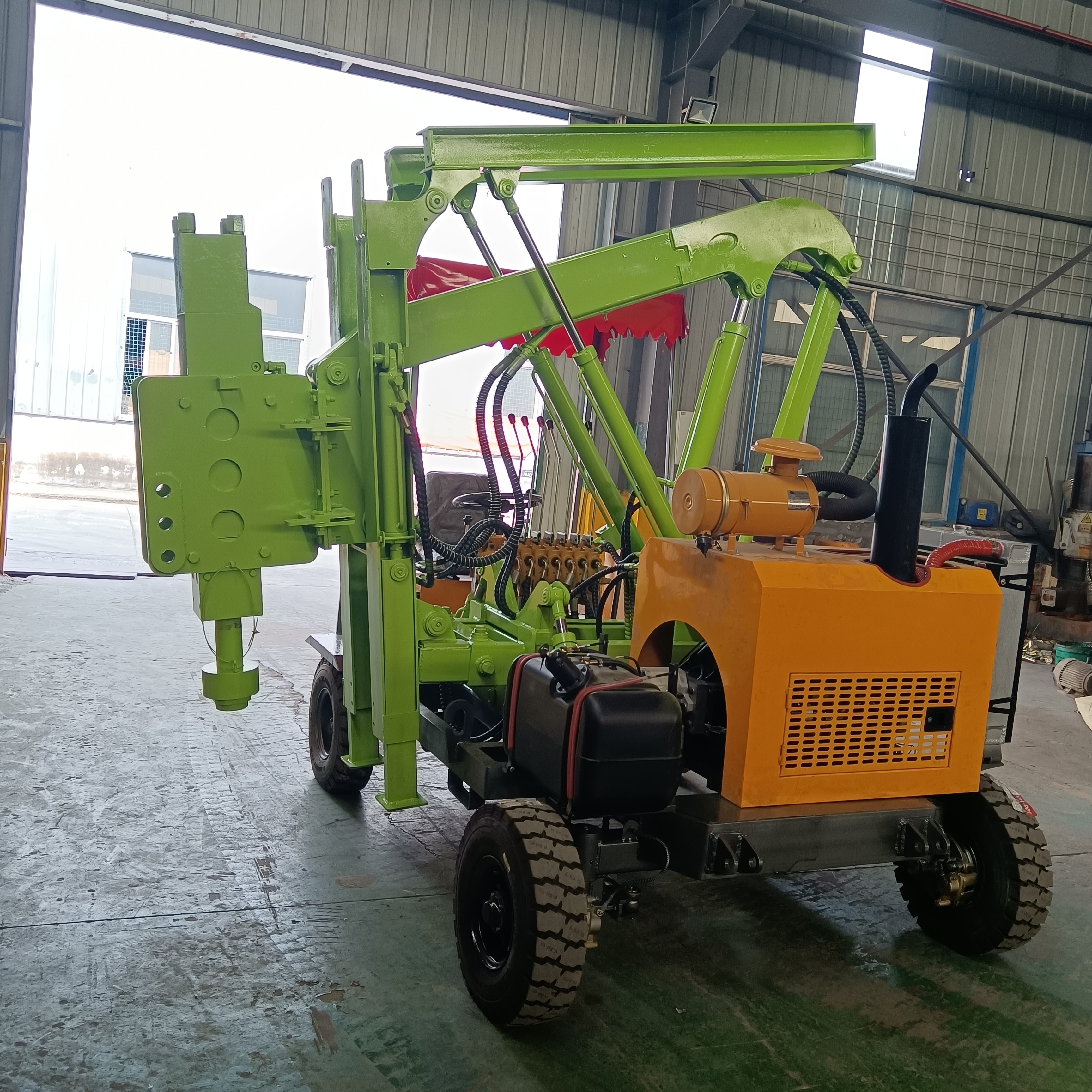 Installation and construction of a small four wheel drilling and extraction integrated construction team for highway guardrail pile driver with loading hydraulic system