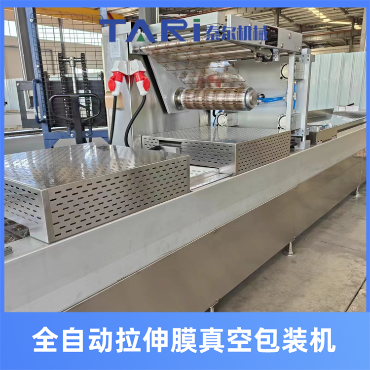 Compressed biscuit fully automatic stretching film vacuum packaging machine kelp silk automatic vacuum sealing machine assembly line