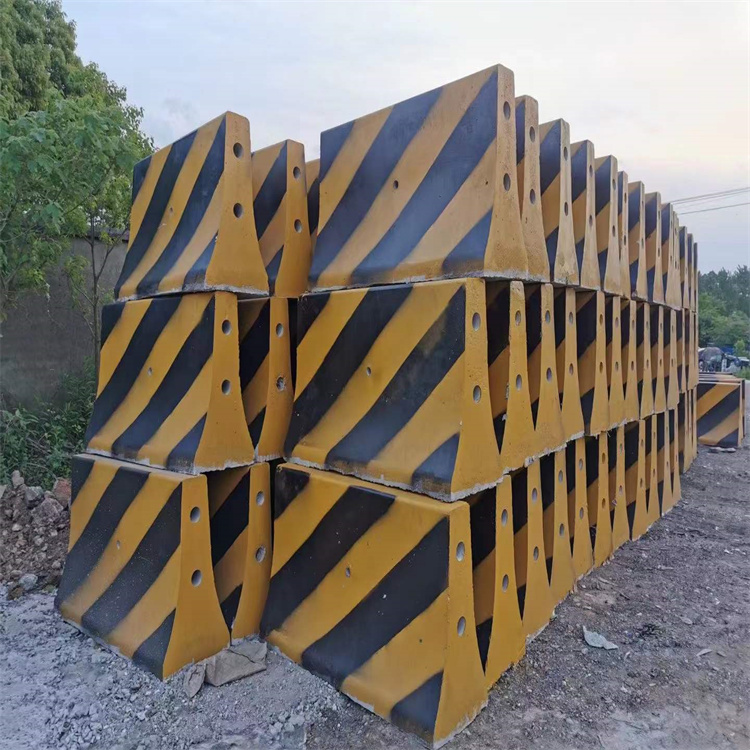 Cement isolation pier, middle guardrail, parking lot, yellow and black warning pier, concrete enclosure pier