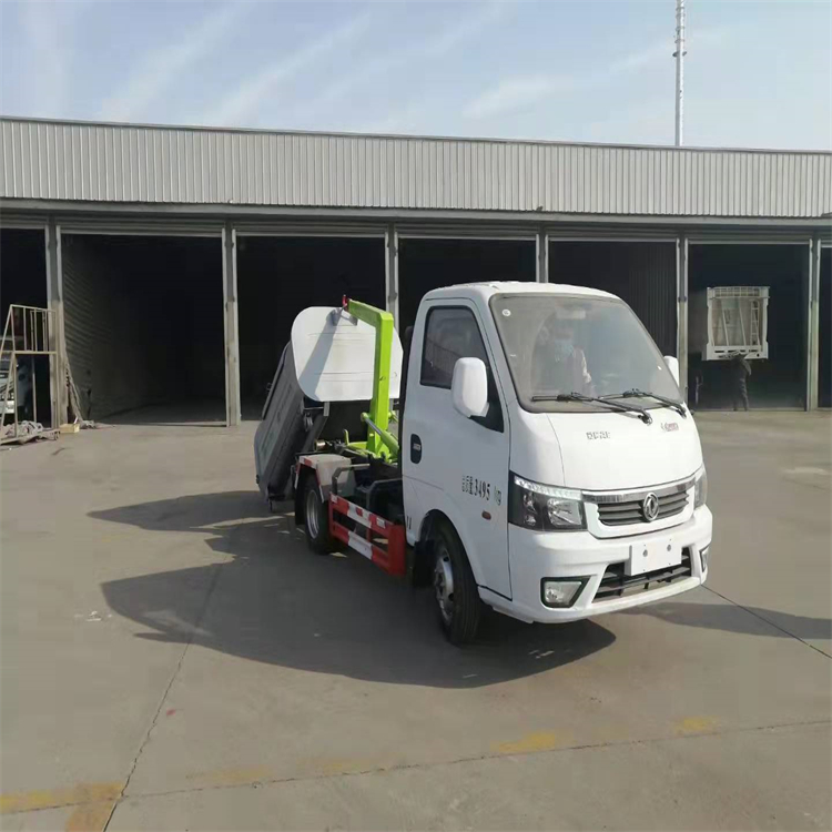 Dongfeng Xiaokang 3-way carriage detachable hook arm garbage truck with blue license plate can enter the underground garage, with one vehicle equipped with multiple containers