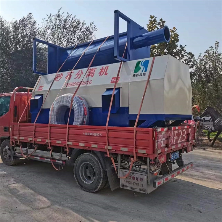 Left parking drum sand and gravel separator, right parking concrete mixing plant with zero discharge