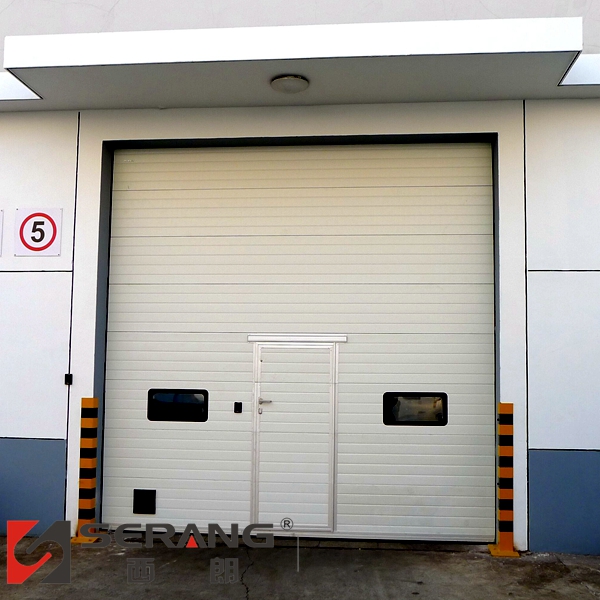 Zibo Large Factory Electric Sandwich Steel Insulation Industrial Lift Door