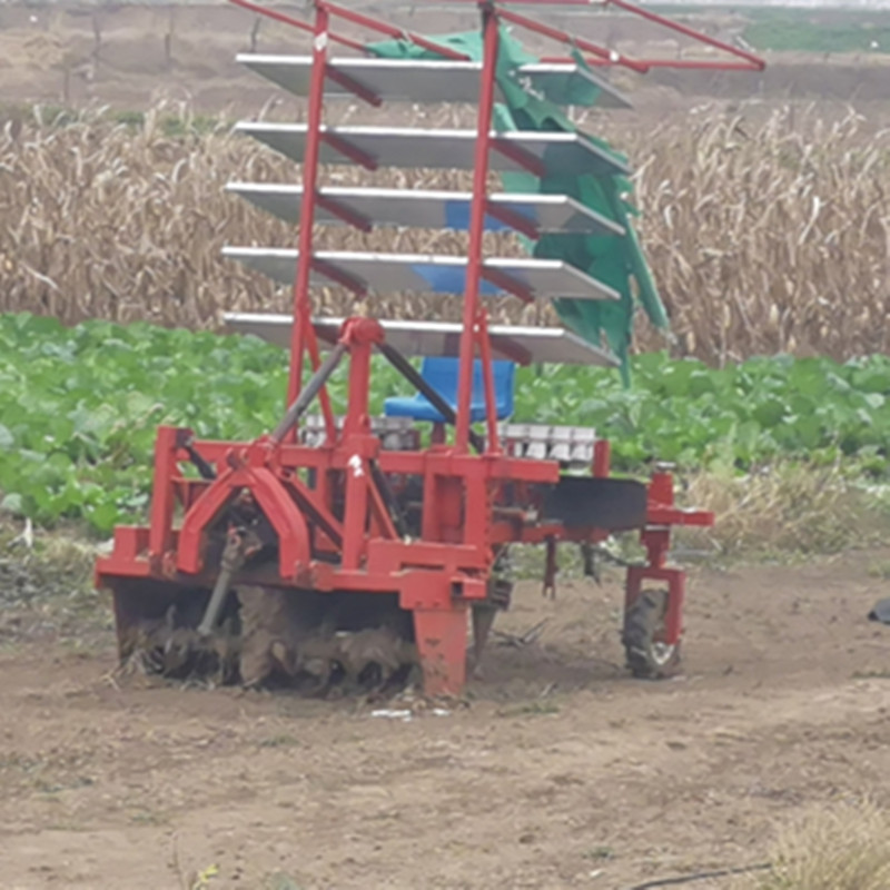 Four wheeled tractor driven chili seedling planter for greenhouse tomato seedling transplanter can increase ridging and film laying