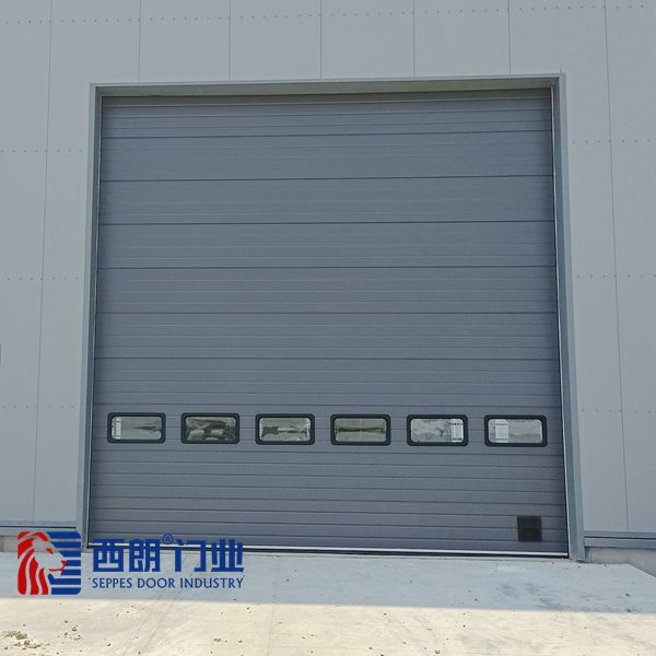 Zibo Large Factory Electric Sandwich Steel Insulation Industrial Lift Door