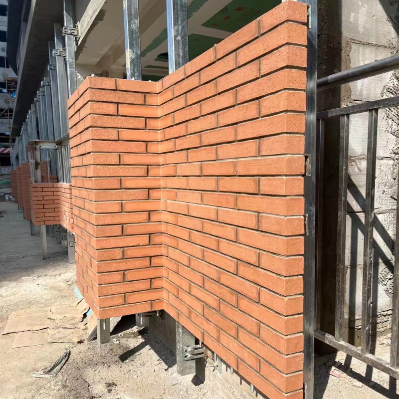 Manufacturer of hollow wall bricks for school gymnasiums with porous large clay block bricks hung on the outer wall with blue pottery bricks