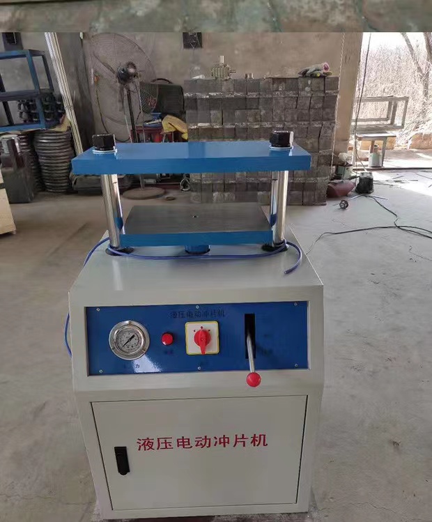 First test waterproof roll punching machine dumbbell prototype, manual punching CP-50 type