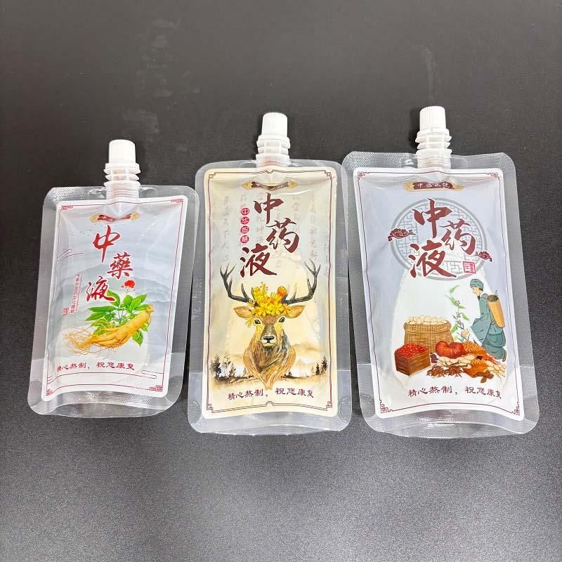 Traditional Chinese medicine liquid packaging bag Liquid traditional Chinese medicine roll film beverage soybean milk suction nozzle self standing bag spot support customization