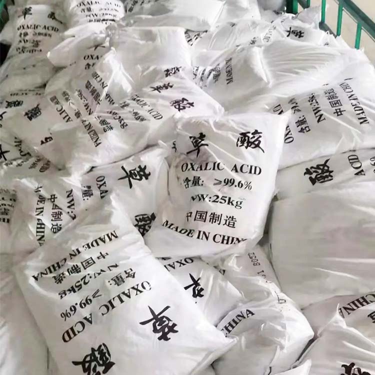 Oxalic acid, industrial grade, with a content of 99%. Anhydrous oxalic acid for descaling, cleaning, bleaching, printing and dyeing