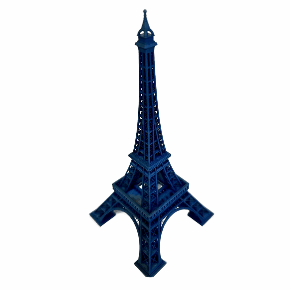 Professional personnel produce blue Eiffel Tower with quality assurance services in place