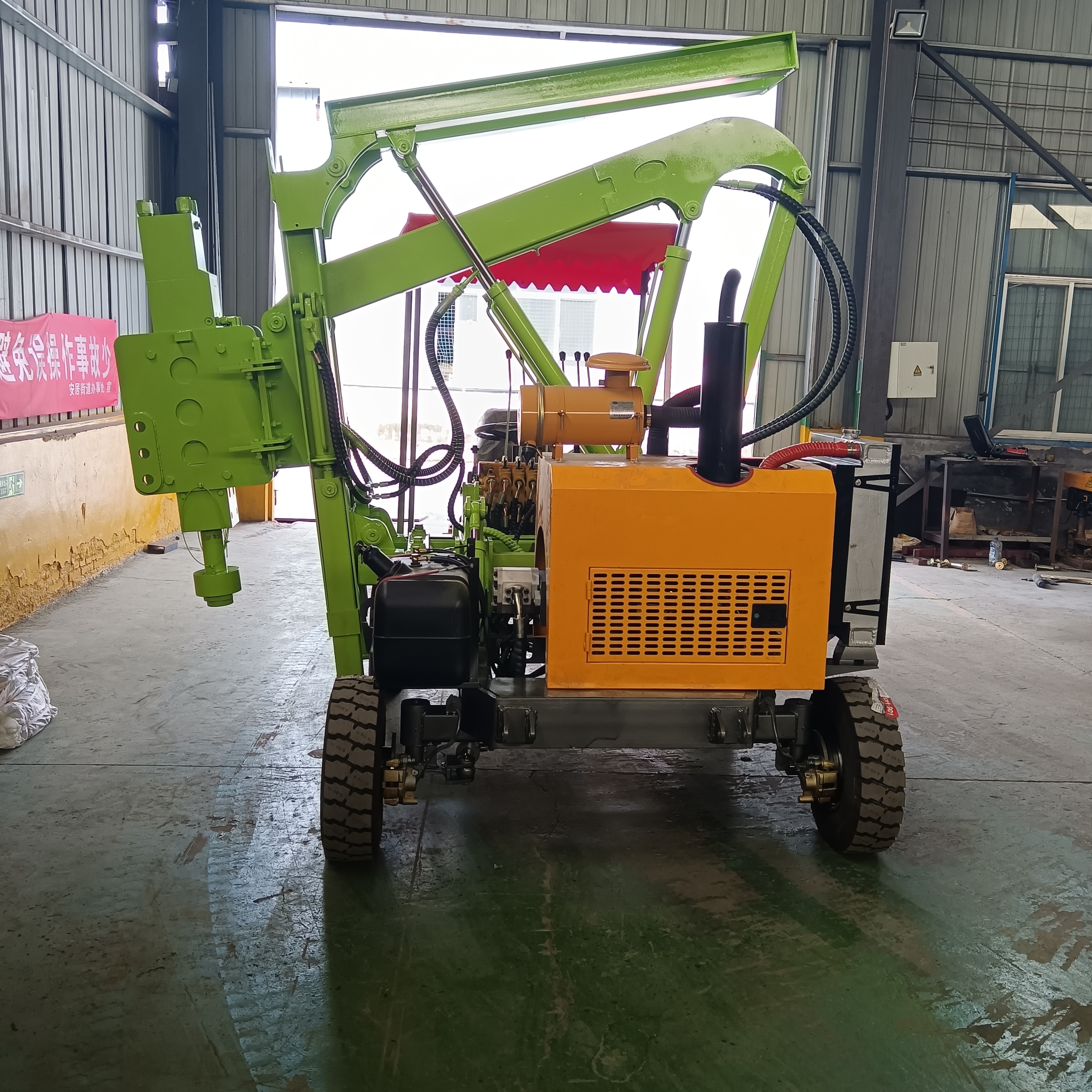 Installation and construction of a small four wheel drilling and extraction integrated construction team for highway guardrail pile driver with loading hydraulic system