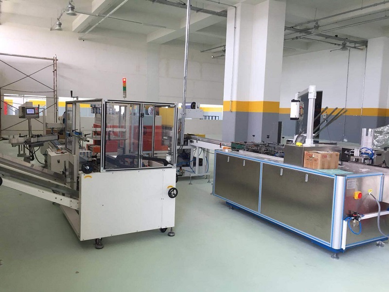 Mobile phone holder packaging automatic box loading machine Mobile phone case Earphone data cable packaging machine Packaging equipment manufacturer