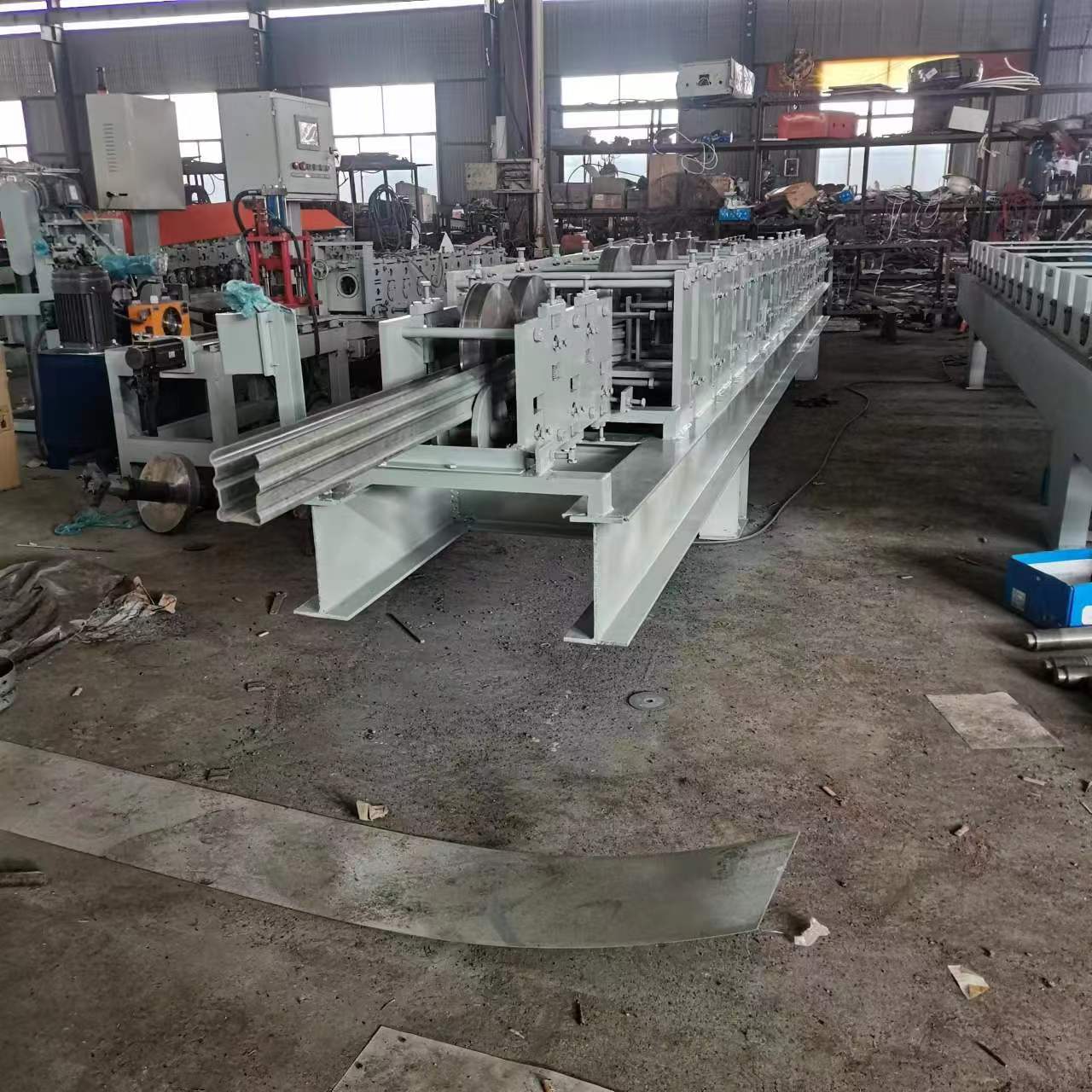 Manufacturer of fully automatic industrial side hung heavy door frame edge wrapping forming mill, cold bending forming machine production line