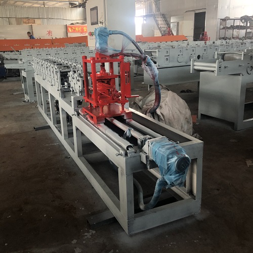 Full automatic galvanized iron stainless steel smoke stop vertical wall layering machine Fire Roller shutter plywood machine Source manufacturer