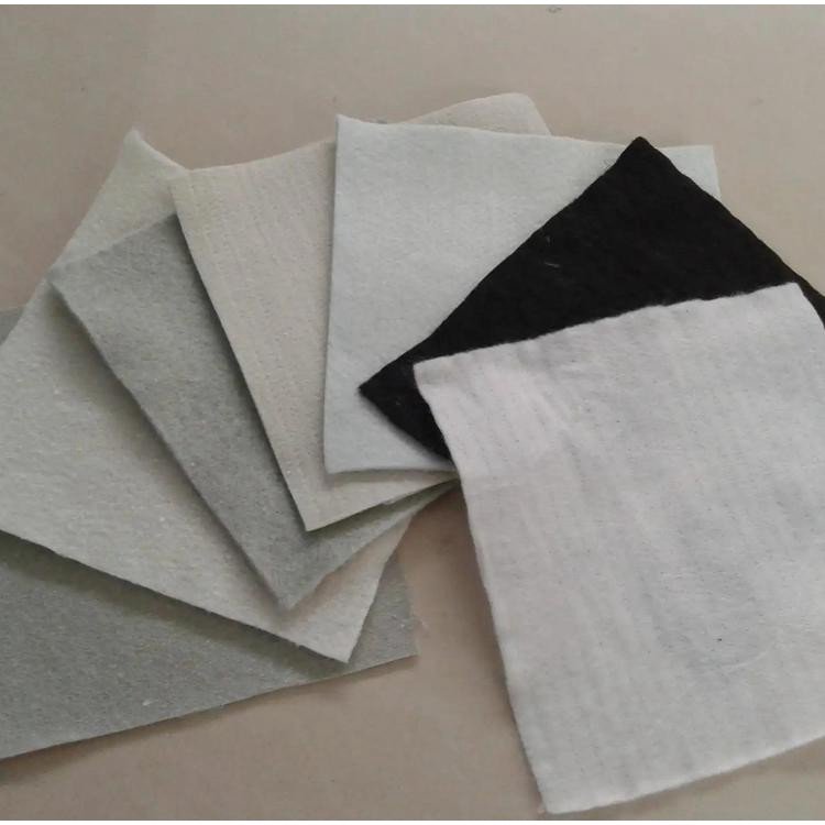 White short silk needle punched geotextile for isolation, filtration, and drainage, impermeable long silk polyester fabric for road maintenance