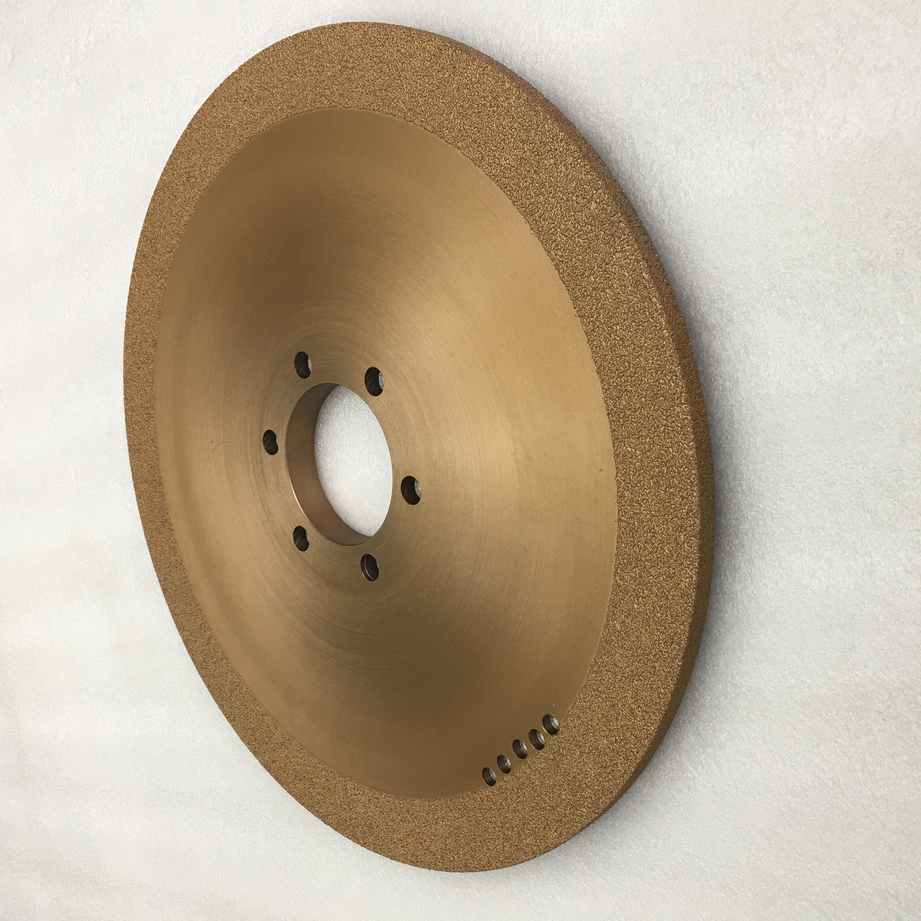 Ordered arrangement of diamond abrasives for special shaped grooves in processing cast iron plastic parts with brazed grinding wheels