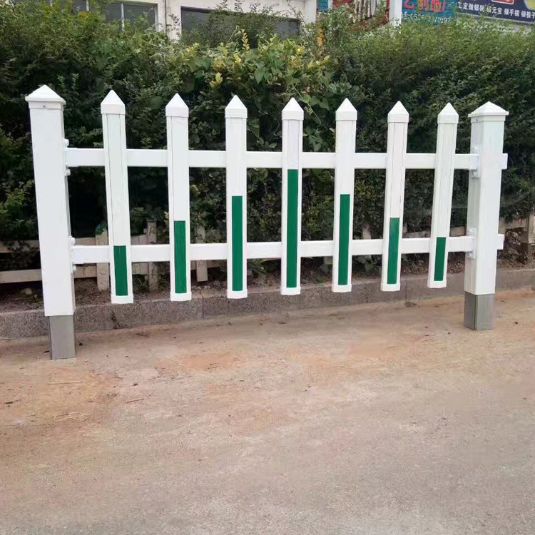 Green lawn guardrail in the park community, PVC plastic steel fence, flower pond garden isolation fence, spring rain