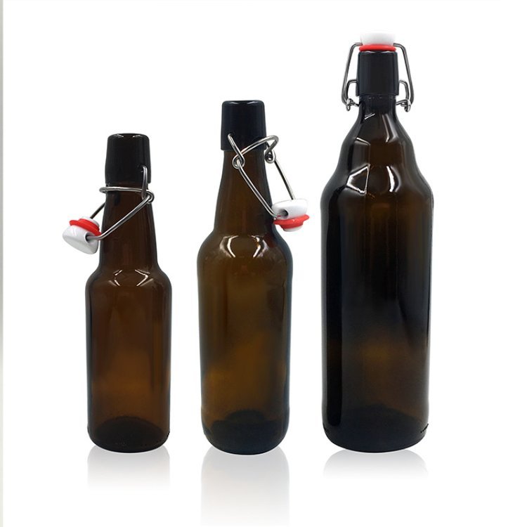 Brown glass beverage bottle buckle, red brown transparent glass bottle with lid, beer bottle, empty bottle, creative glass bottle