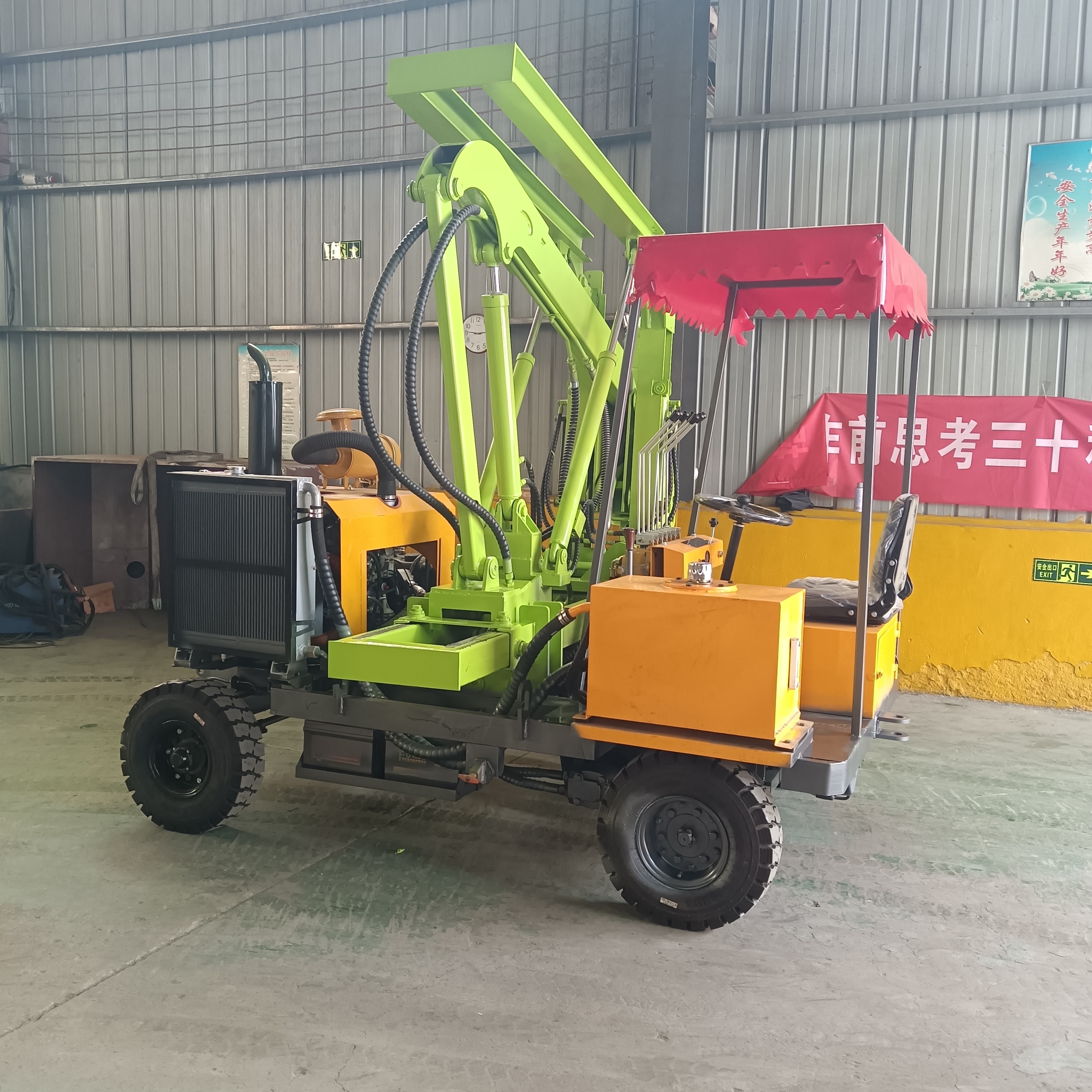 Installation and construction of a small four wheel drilling and extraction integrated construction team for highway guardrail pile driver with loading hydraulic system