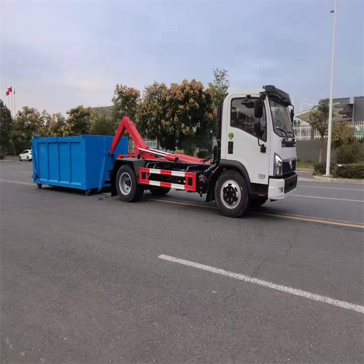 Dolika 3308 wheelbase garbage truck equipped with hook arm self dumping and other multi-purpose vehicles are sufficient and can be mortgaged