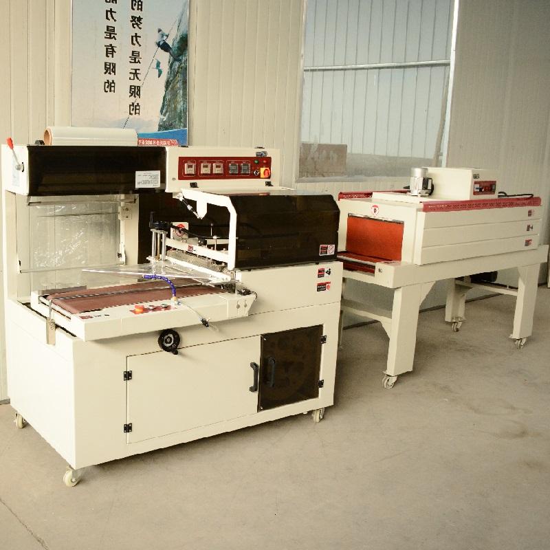 Tianlu Photo Album Sealing, Cutting, and Shrinking Machine TL55450 Photo Frame Shrinkage Film Packaging Machine Manufactured by the Manufacturer