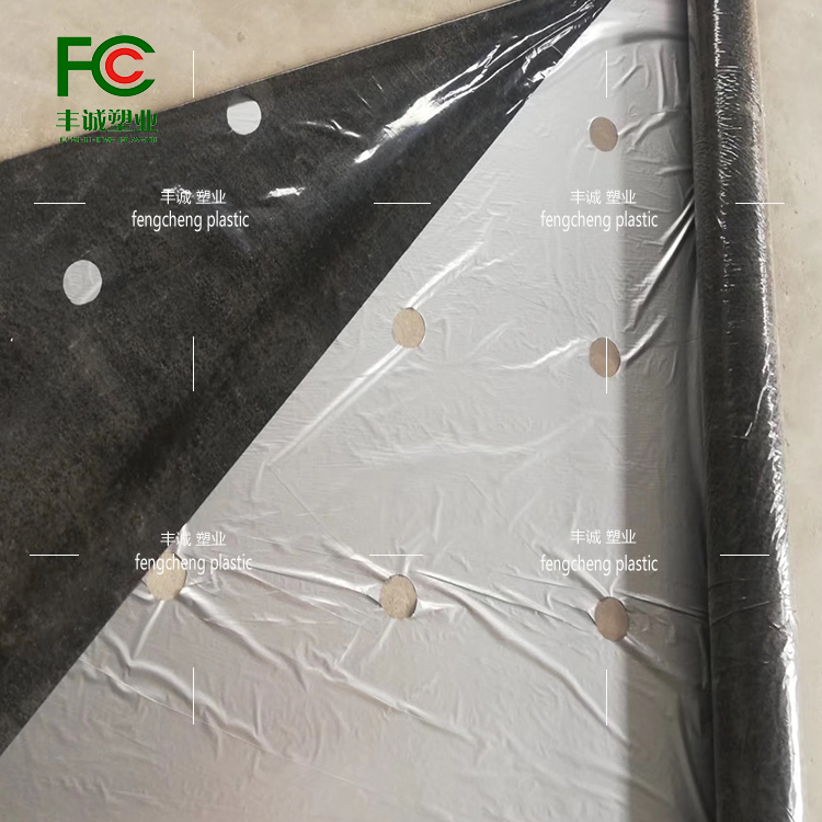 Agricultural perforated plastic film for weeding, insulation and moisturizing, black silver black and white perforated film