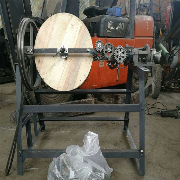 A straw rope machine for weaving straw ropes. Electric two strand wheat and rice straw rope tying equipment