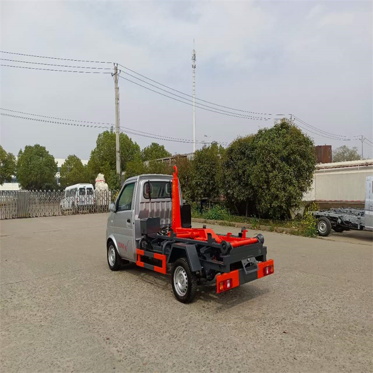 The Chang'an 3-way hook arm garbage truck is convenient for transportation and can operate multiple containers flexibly