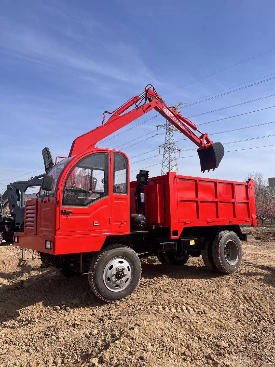 Truck mounted excavator for digging, loading, and transportation in the sand field