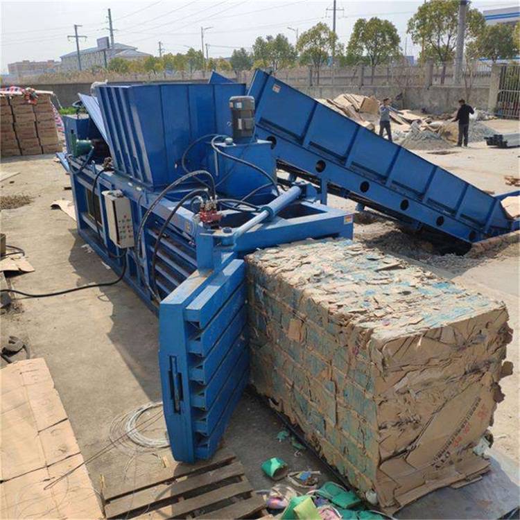 Waste plastic film Drink can briquetting machine 80t horizontal waste paper hydraulic packer Waste station waste compression