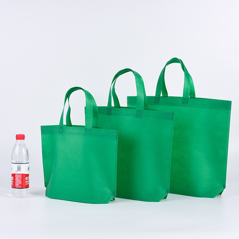 Handheld non-woven fabric bag, customized blank advertising, solid color foldable shopping bag, catering, disposable takeaway packaging bag