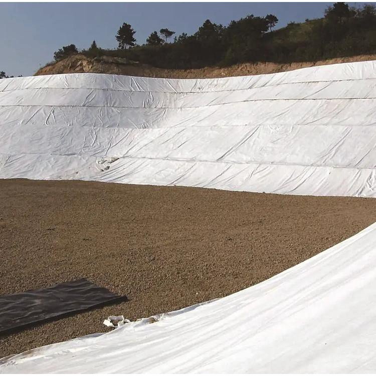 White short silk needle punched geotextile for isolation, filtration, and drainage, impermeable long silk polyester fabric for road maintenance