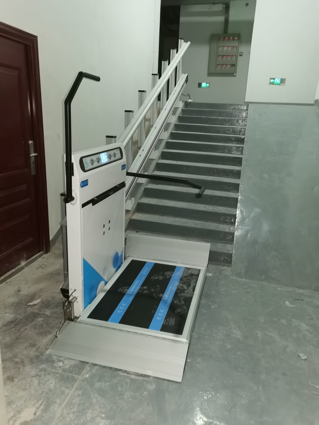 Accessible wheelchair lifting platform with elevators installed on the stairs and steps, customized disabled elevator