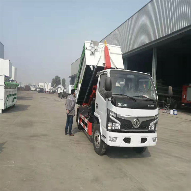 Dolika 3308 wheelbase garbage truck equipped with hook arm self dumping and other multi-purpose vehicles are sufficient and can be mortgaged